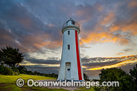 Sunset over Mersey Bluff Lighthouse. This lighthouse, established in 1889, is situated at the mouth of the Mersey River near Devonport, Tasmania, Australia.