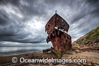 The remains of HMQS Gayundah Shipwreck. The Gayunday was the first warship in Australia to operate wireless telegraphy successfully. In 1958 the Gayundah was beached in its current location to serve as a breakwater. Queensland, Australia.