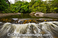 Rocky water rapids in the Never Never River, situated in the Promised Land, near Bellingen, New South Wales, Australia.