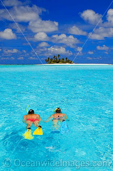 Snorkellers at tropical Island photo