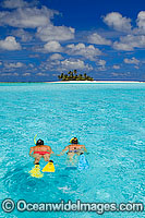 Snorkellers at tropical Island Photo - Gary Bell
