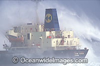 Wave breaking over ship Photo - Chris and Monique Fallows
