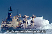 Wave breaking over ship Photo - Chris and Monique Fallows