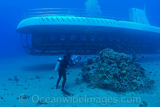 Scuba Diver filming Atlantis submarine photo