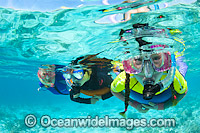 Family Snorkeling Great Barrier Reef Photo - Gary Bell