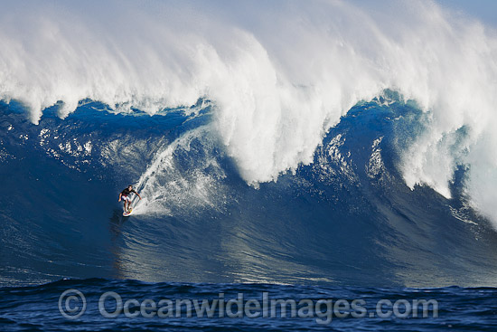 Surfer tow-in Hawaii photo