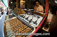 Deep fried Insects on a Stick Photo - David Fleetham