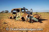 Old car riddled in bullet holes Photo - Gary Bell