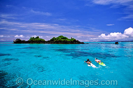 Snorkelers on Coral reef Fiji photo