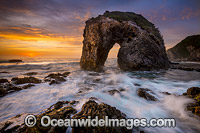Coastal Seascape, showing sunrise at Horse Head Rock. Bermagui, New South Wales, Australia.