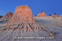 Eroded sand dunes, known as 'Walls of China', during dusk twilight. Mungo World Heritage National Park, New South Wales, Australia