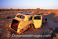 Abandoned old car at sunset. Silverton, South Australia