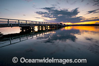Sunset over Wallaga Lake and Historic Bridge. Bermagui, New South Wales, Australia.